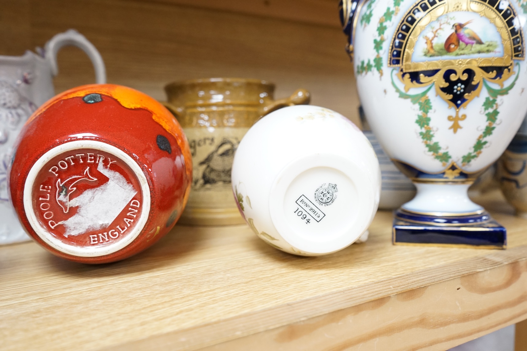 A collection of seven various ceramic vessels including Bretby, Poole, Worcester, continental art pottery etc. 26cm